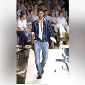 Men's Light Blue Distressed Jeans from a runway show